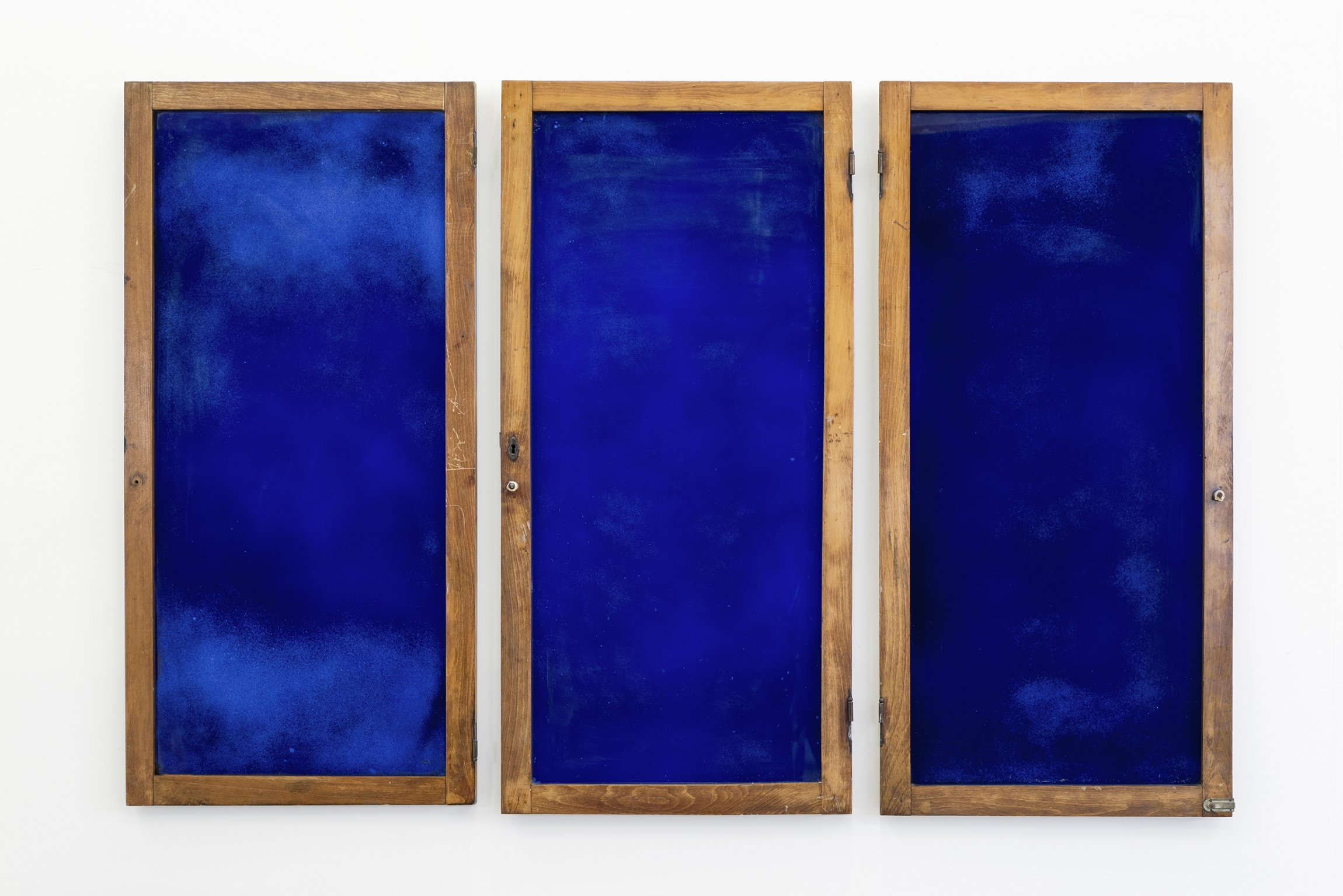 Rayyane Tabet, Untitled, 2023, three wooden windows, glass, blue paint, 179 x 117.5 cm