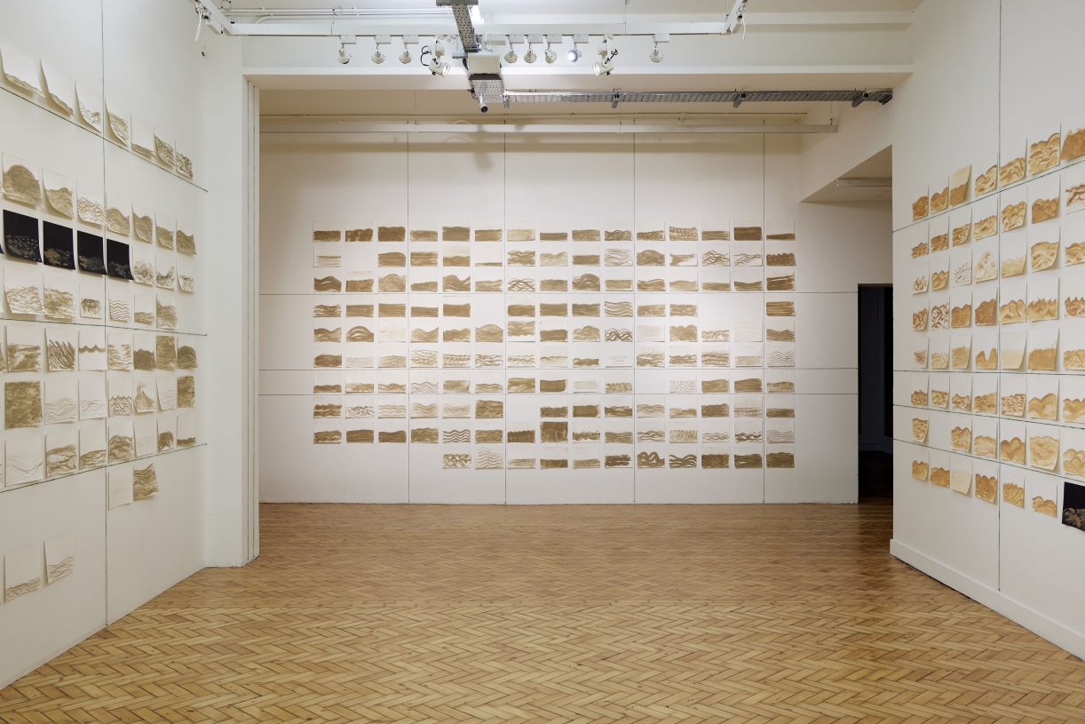 Dineo Seshee Bopape, Master Harmoniser, 2020, Drawings, clay and soil on watercolour paper, Courtesy the bakgethwa ancestors, Installation view: Artes Mundi 9. Photography: Polly Thomas