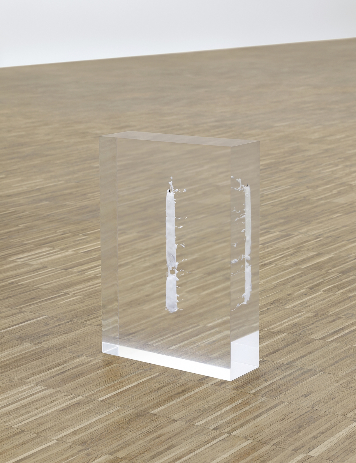 Tarik Kiswanson, Respite, 2020, resin, candle, 40 x 28 x 9 cm, courtesy the artist and Sfeir-Semler Gallery Beirut / Hamburg. Exhibition view Tarik Kiswanson. Afterwards, Salzburger Kunstverein 2023, Photo: Rainer Iglar, © Salzburger Kunstverein