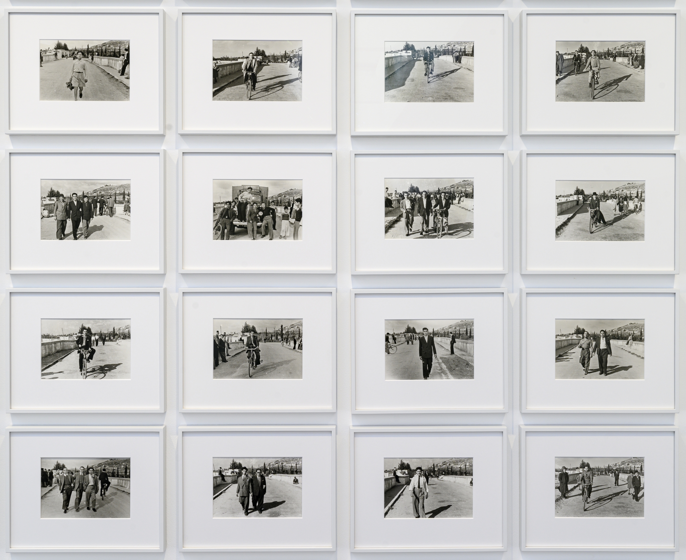 60 Men Crossing Ain El Helweh Bridge, 2007, 36 black and white silver gelatin prints. From the archive of Hashem El Madani, Studio Sheherzade, Saida, 22 x 15 cm each