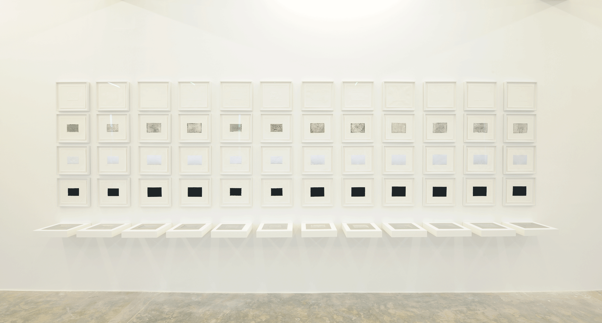 Against Photography, 2017, 12 Routed aluminum plates, 24 x 28 cm each, 4 Sets of intaglio and chine-collé prints, 27 x 31 cm each. Installation view Sfeir-Semler Gallery, Beirut