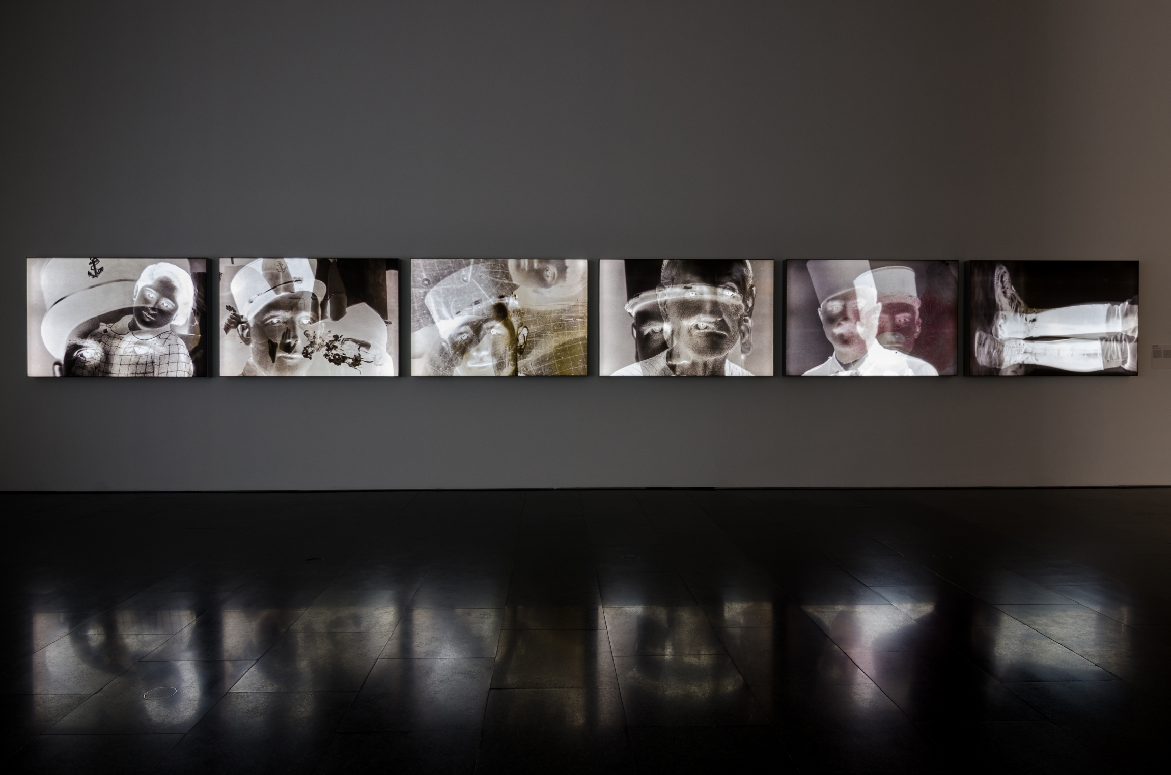 Faces to Faces, 2017, 6 pigment inkjet prints on backlit UV cloth, 100x150x10cm each. Installation view MACBA, Barcelona. © Mirjan Mahmoud