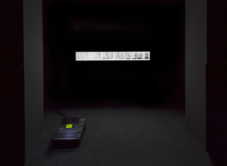 Saydnaya (the missing 19db), 2016, Installation: misking desk, loudspeaker, lightbox, Variable dimensions, Ed. 3 + 2 AP