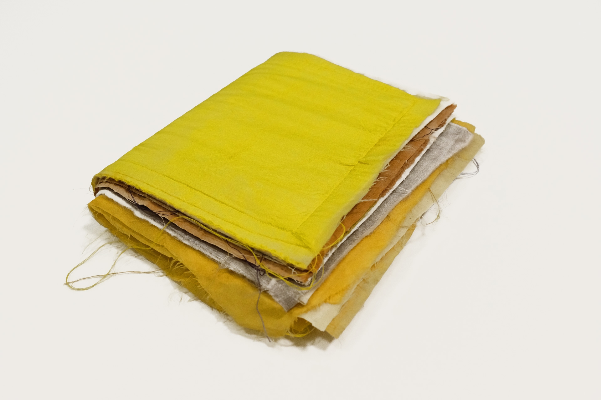 Untitled (Fiber Sample Book), 2016, silk, cotton, felt, 7 single patched, 20.4 x 17 x 6 cm