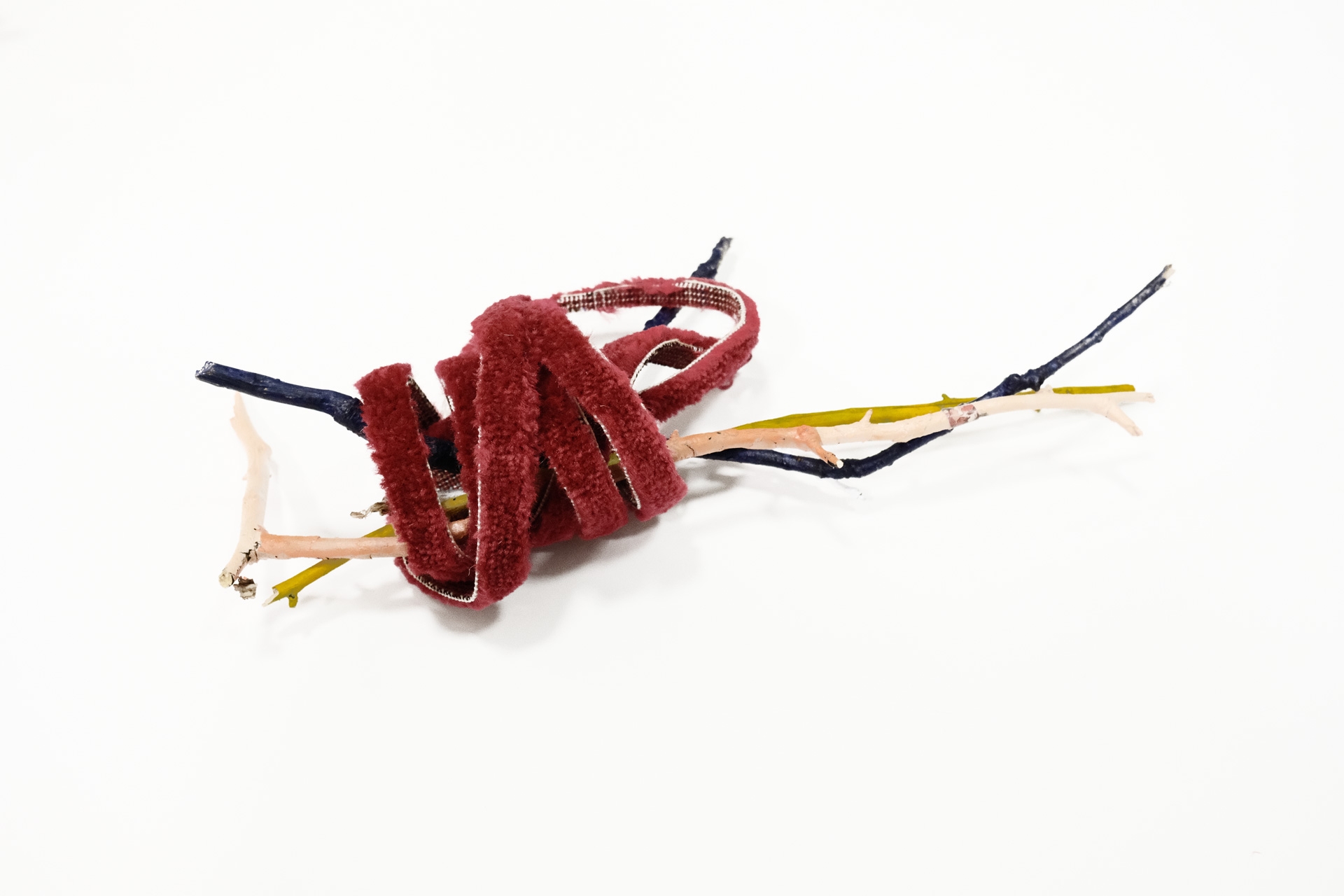 Untitled (Nest), 2016, red carpet, painted wood, 67 x 43 x 43 cm