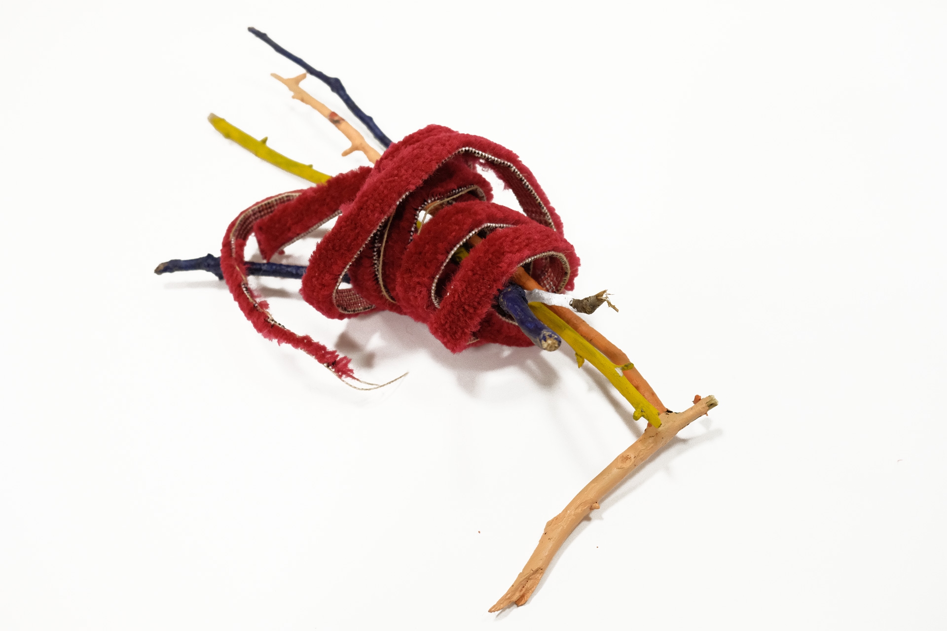 Untitled (Nest), 2016, red carpet, painted wood, 67 x 43 x 43 cm