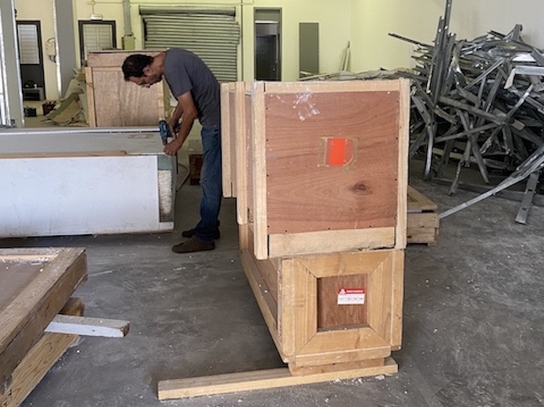 Marwan Rechmaoui checking on his artwork