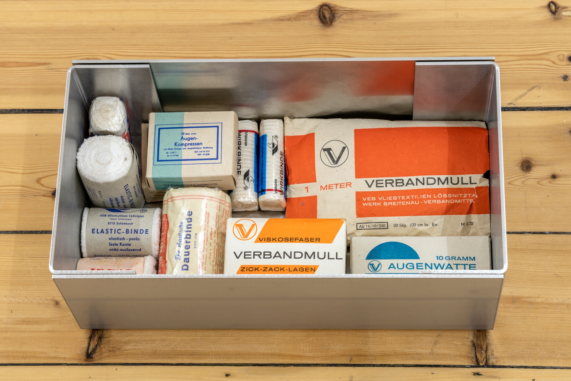 Sung Tieu, First Aid Kit, 2022, Bandages from VEB Vliestextilien Lößnitztal, stainless steel, 13 x 35 x 19 cm, Unique