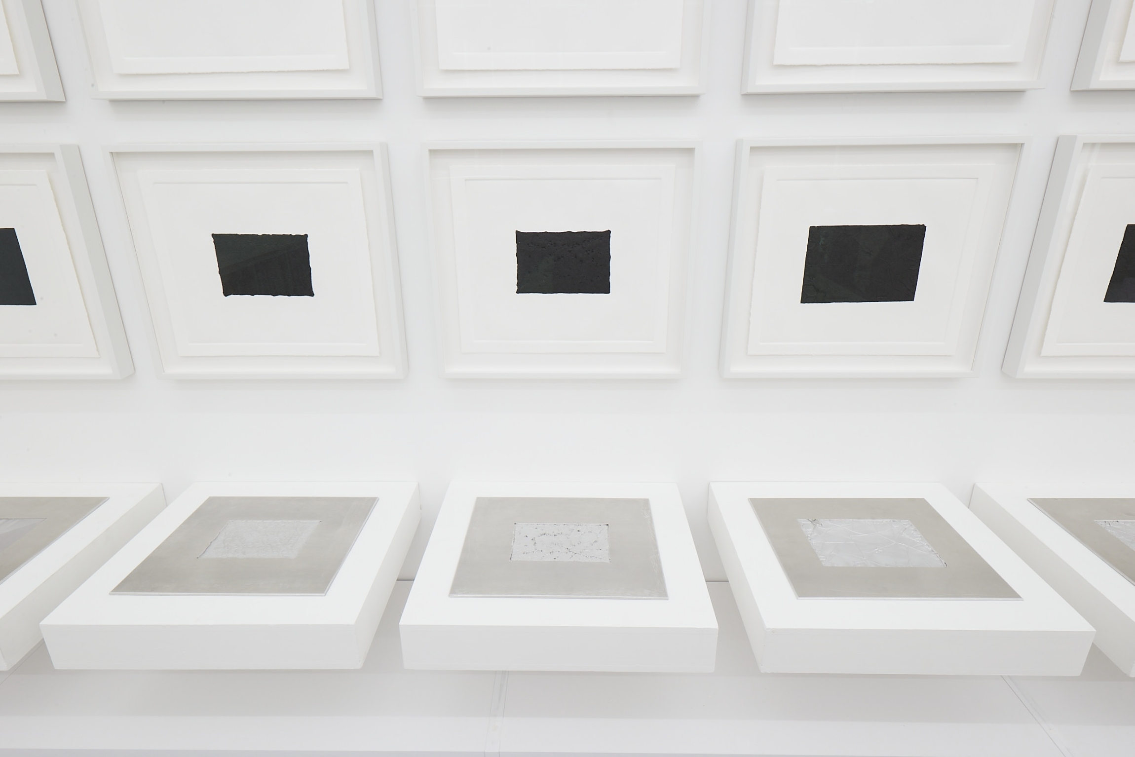 Akram Zaatari, Against Photography, 2017, 12 routed aluminum plates, 24 x 28 cm each, 4 sets of intaglio and chine-collé prints, 27 x 31 cm each