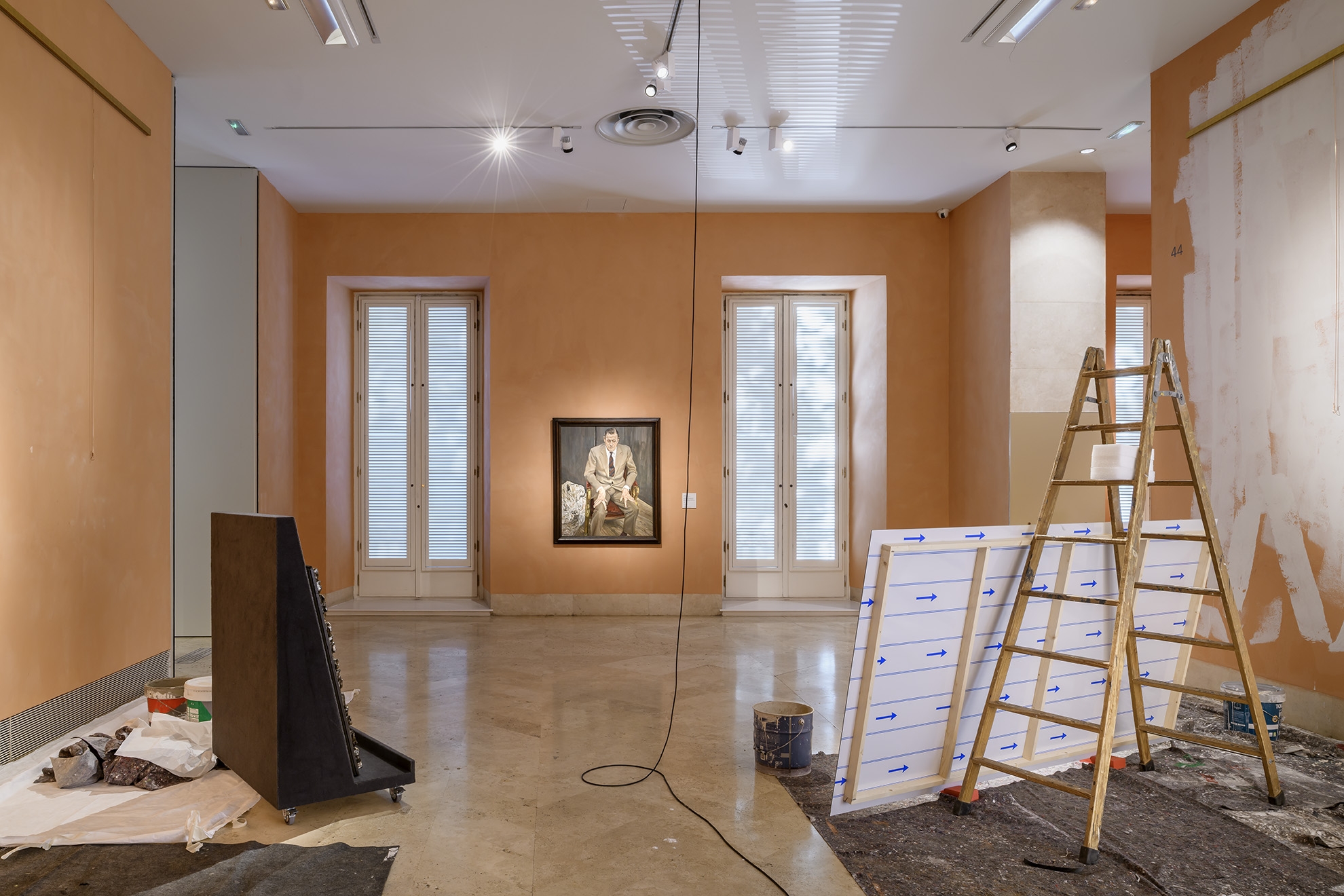 Walid Raad, Frontispiece IV: The Hangs, 2021, Installation with paint, metal, wallpaper, buckets, brushes, pigmented inkjet print, Installation view Museo Nacional Thyssen-Bornemisza, Madrid, 2021