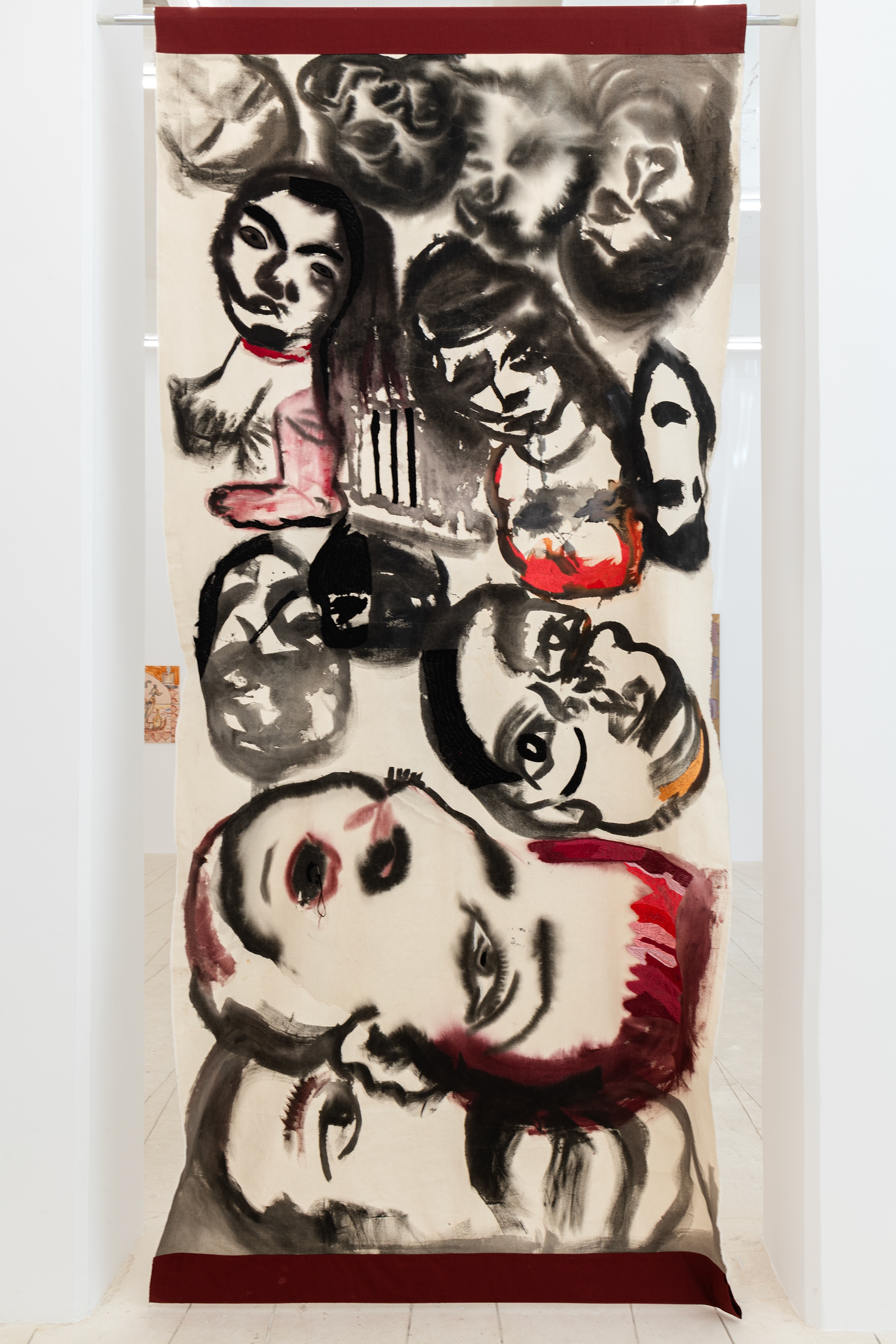 Pyramid of Heads, 2025, Paint and embroidery on textile, 346 x 159 cm