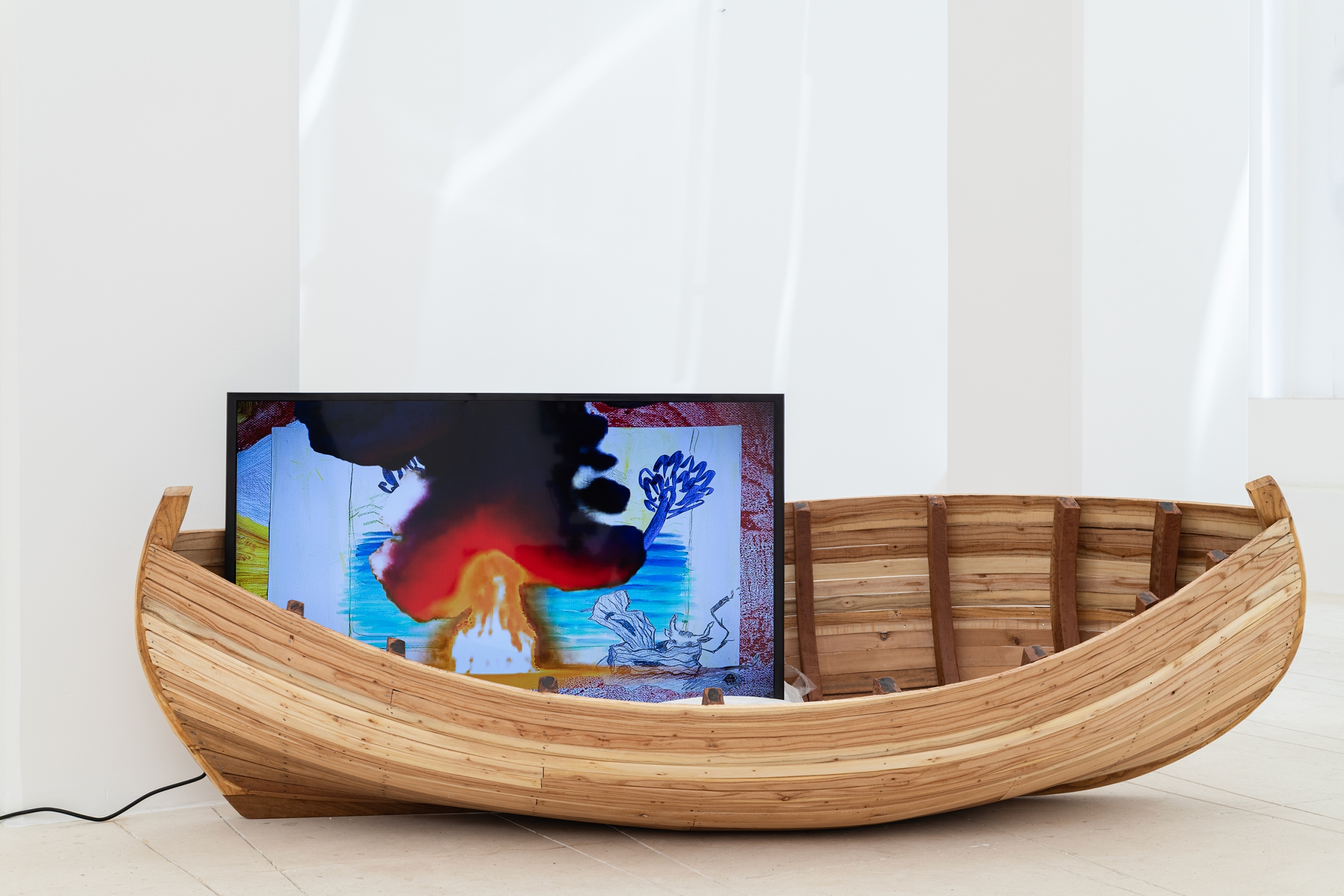 Two Airplanes and the Luggage, 2025, Wood, salt, video, sound, 60 x 210 x 85 cm, 1' 35''