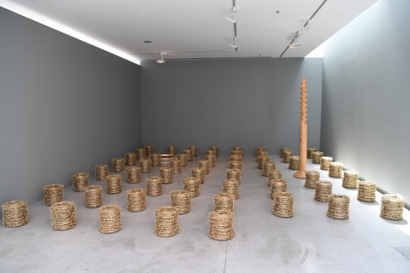 Area C Fields of Gold (Not everything that shines is Gold), 2017, 60 metal barbed wire coils, metal, paint, diameter 40 x 30 cm each. Installation view, Sharjah Art Foundation