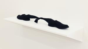 Left Apart, 1999, Two leather shoes, size 41 and size 43, socks, 99 x 10 x 11 cm, Ed. 1 + 1 AP