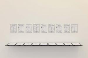 Conflicted Phonemes, 2012,  Timeline: Vinyl wallprint 267 x 205 cm,  Individual voice-maps, A4 black and white: vinyl wall prints & take away copies printed on embossed paper on a shelf. Wall print 265 x 205 cm; A4 papers 21 x 29.7 cm. Ed. 5 + 2 AP. Installation View, Sfeir-Semler Gallery Beirut, 2017