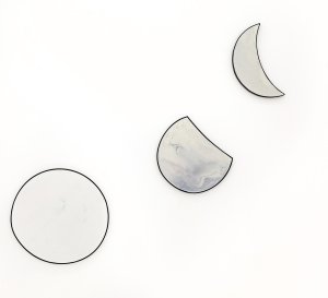 Moon(s), 2024, Beeswax, oil paint on iron and wood, ⌀  60 cm (full moon), 45 x 40 cm (waxing gibbous), 46 x 33 cm (waning crescent)